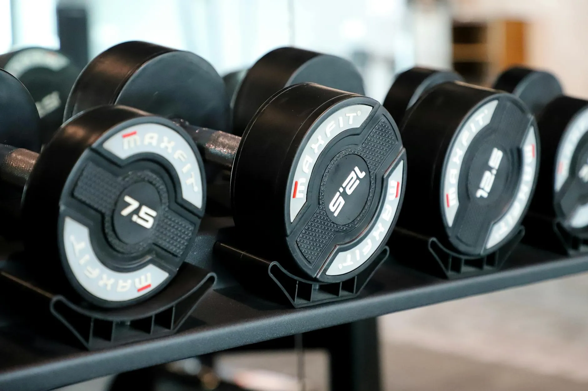 Strength and cardio equipment in a smaller-format gym setting