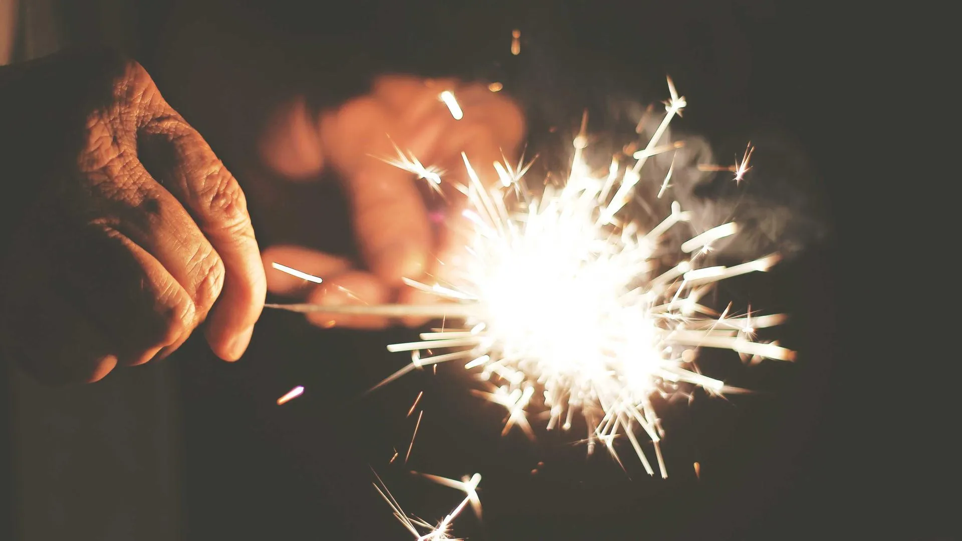 Breakfast sandwiches, bagels, and takeaway coffee on a city counter