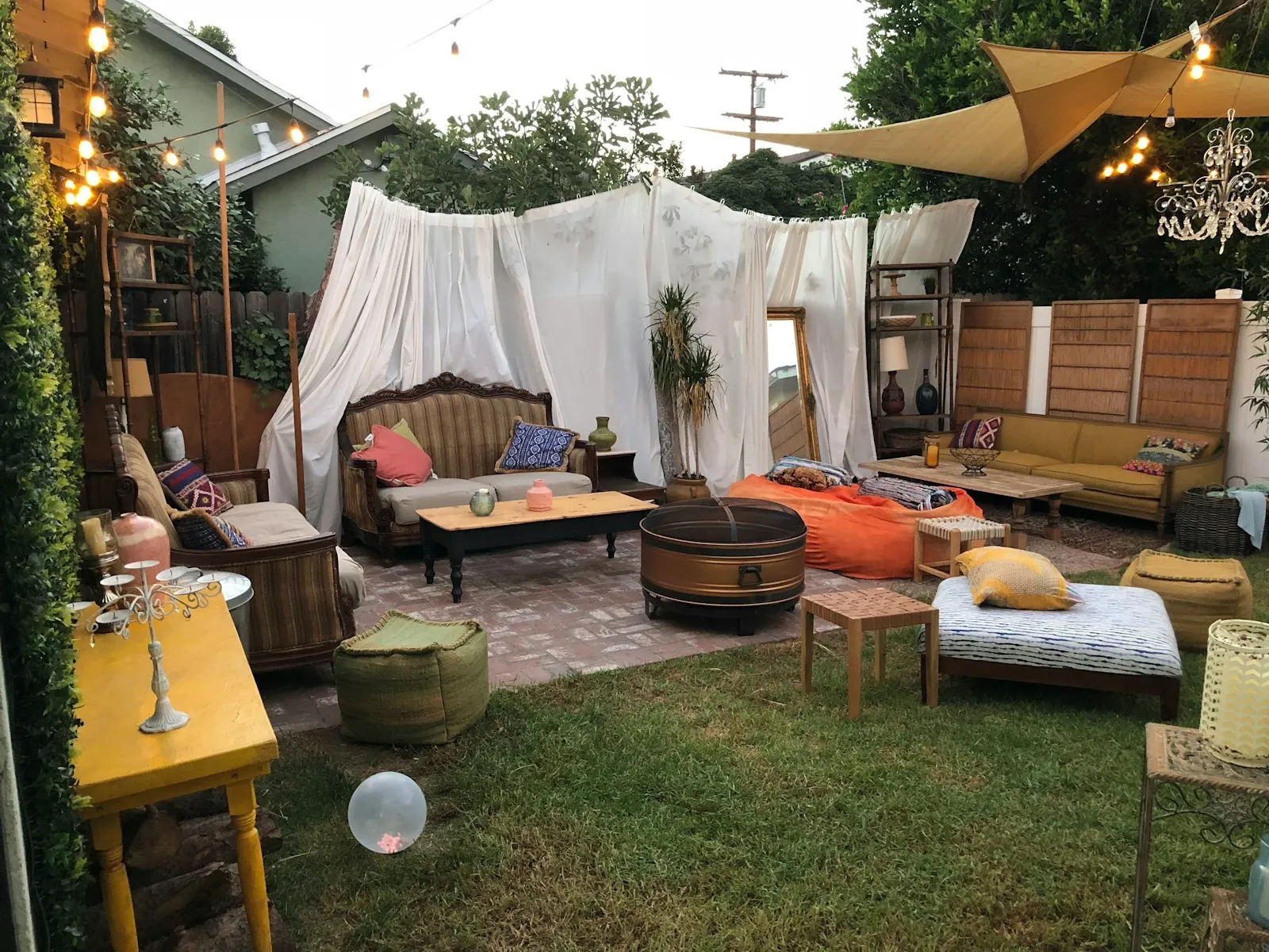 Parents setting up a backyard party area