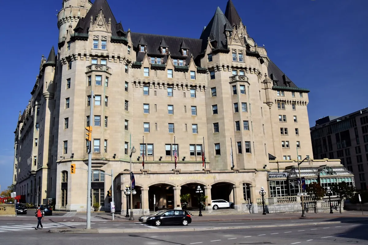 The Château Laurier historic hotel reflected in the Rideau Canal