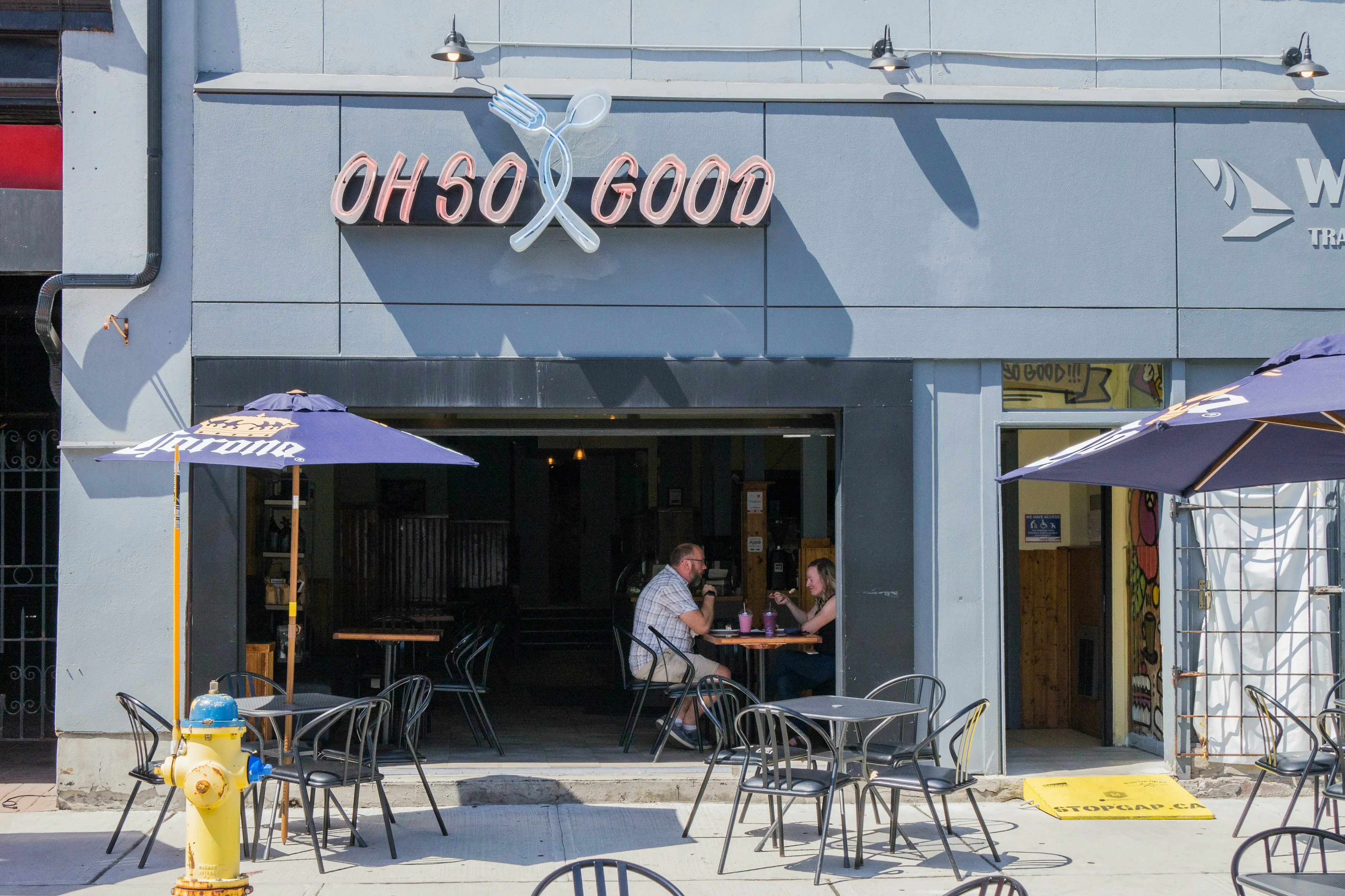 Traditional Greek restaurant interior with warm lighting and taverna atmosphere