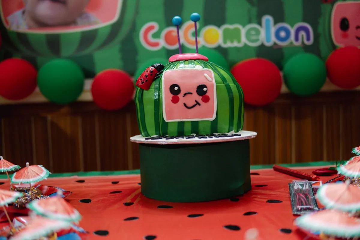 A group of kids of different ages celebrating together