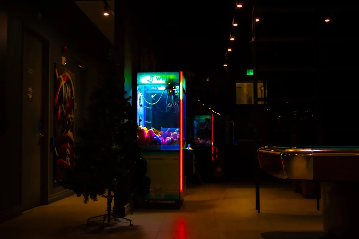 Indoor glow-in-the-dark mini golf with neon obstacles