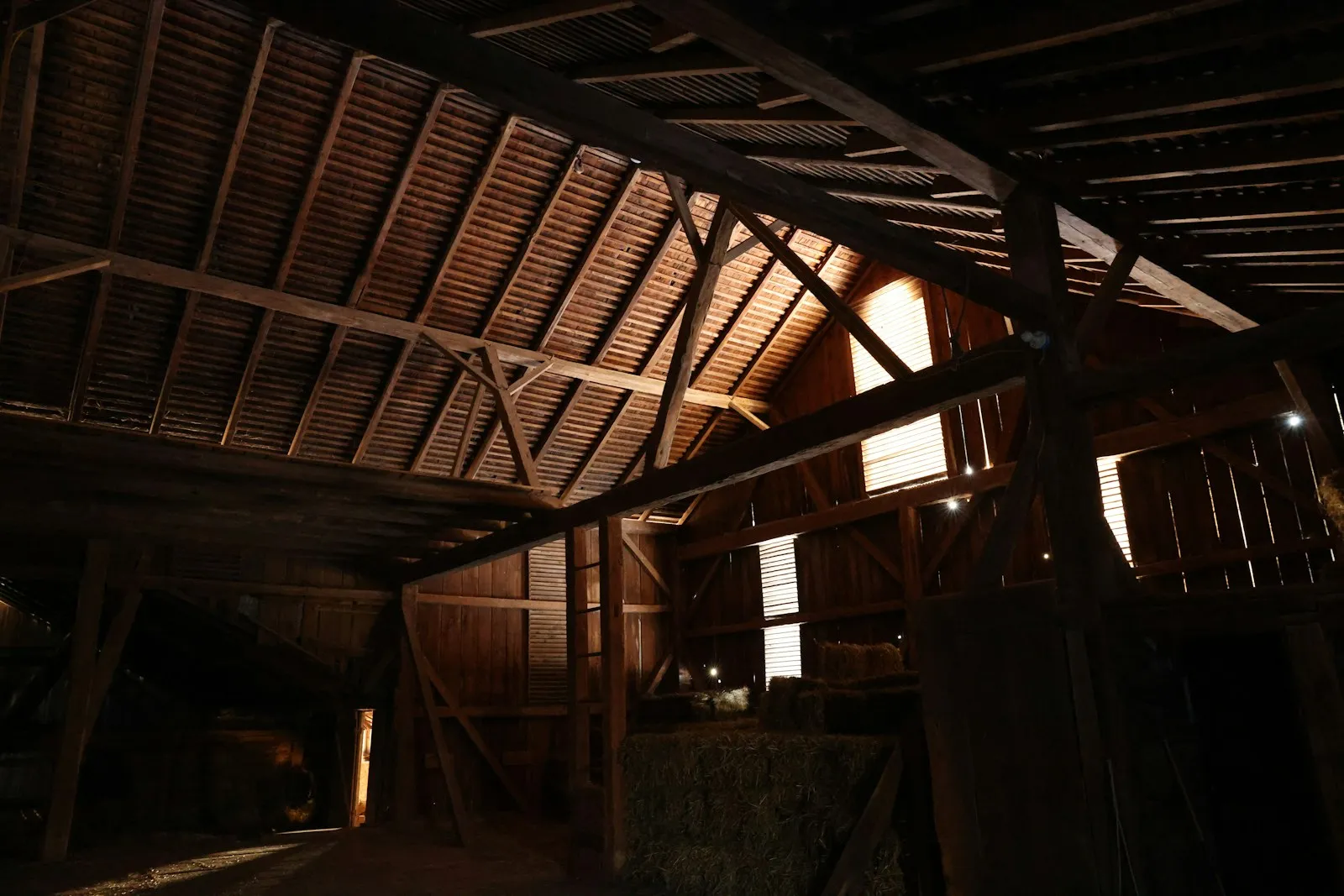 Barn interior with feeding stations