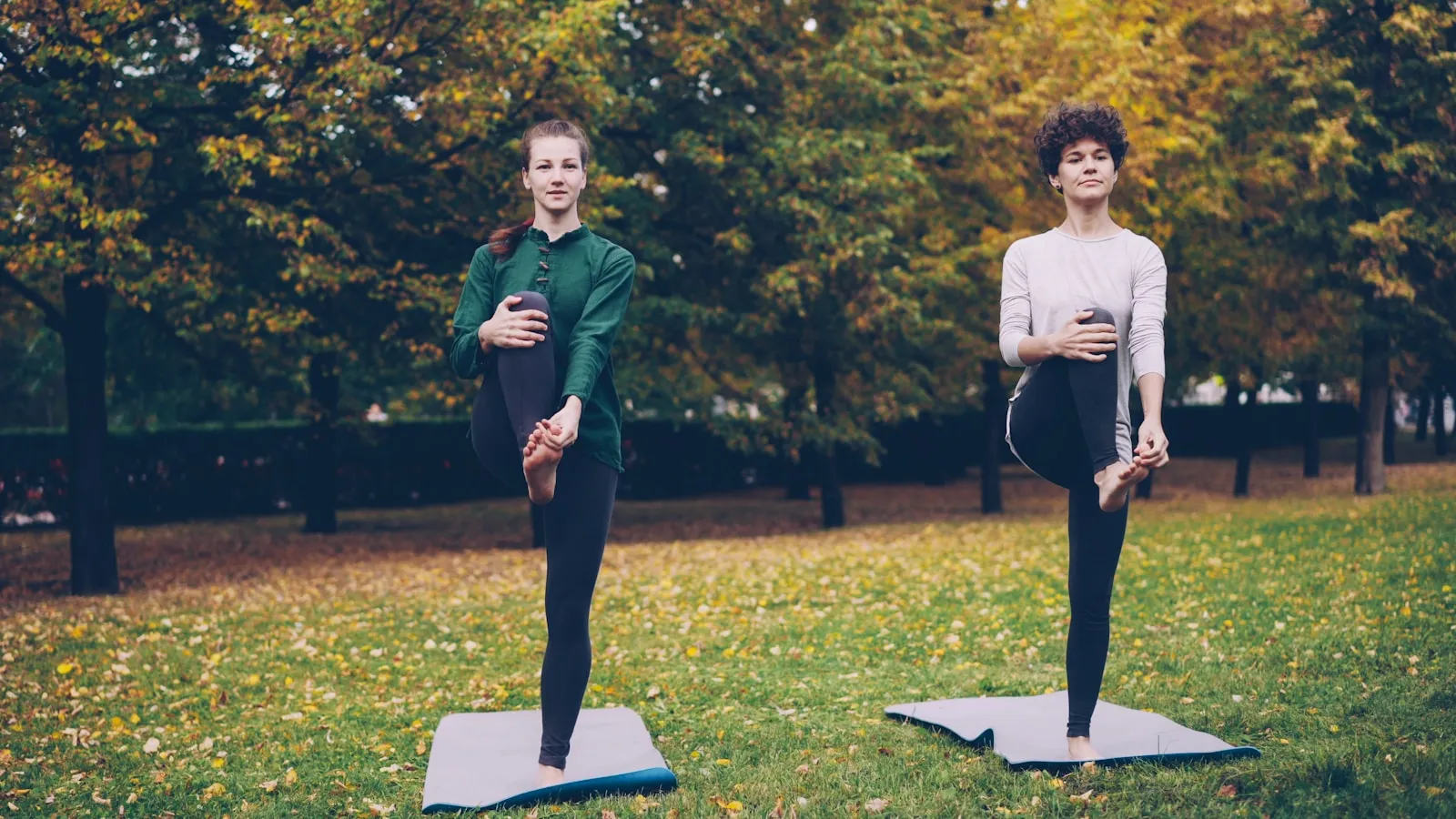Outdoor yoga session in a city park