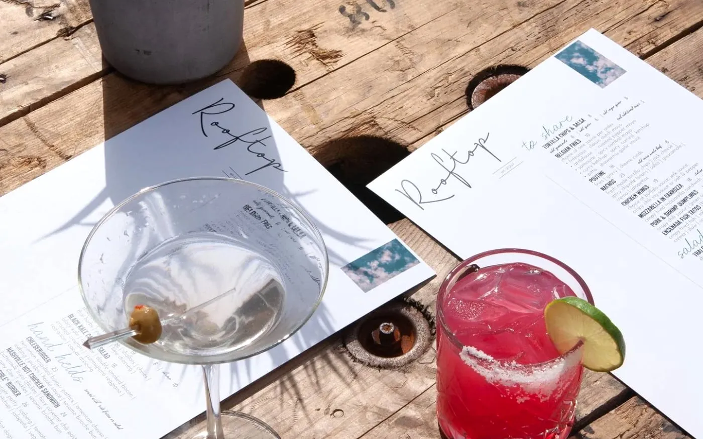 Rooftop Ottawa table with cocktails and menus, matching reservation and planning tips