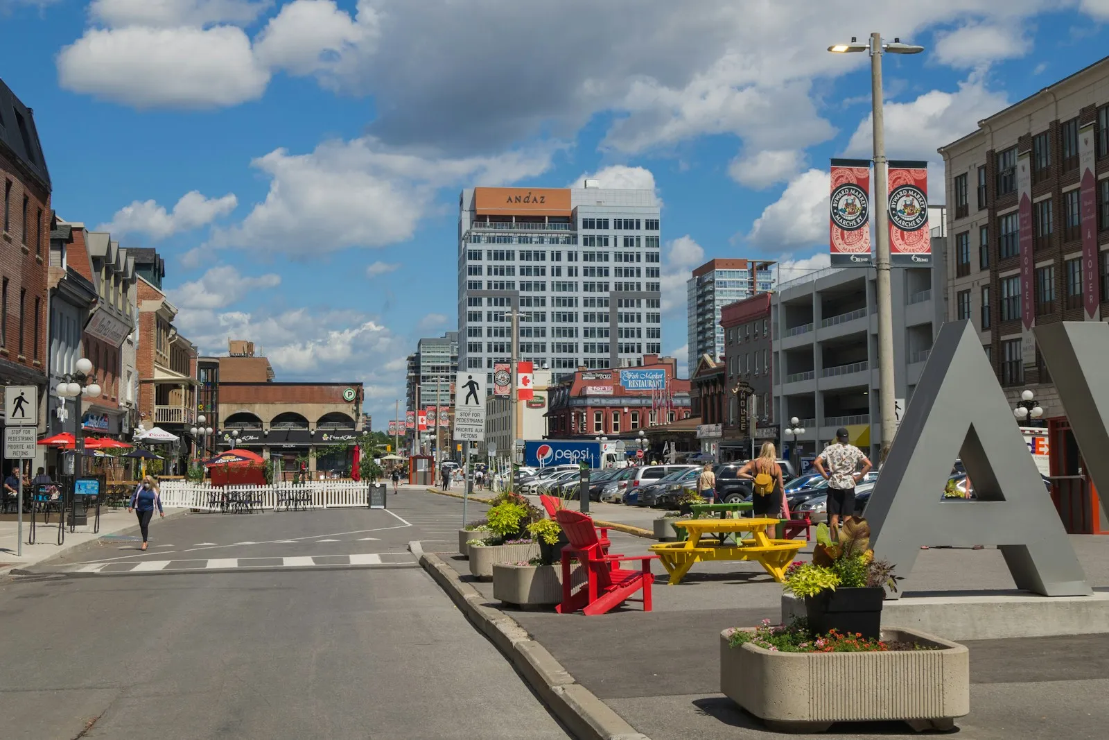 People waiting outside a VR venue at dusk