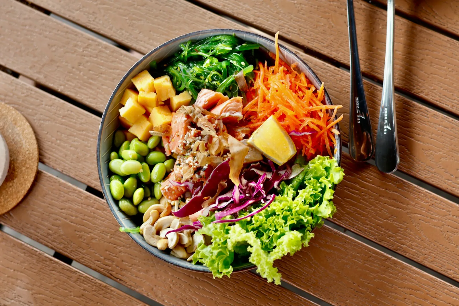 Assorted poke bowls with colourful toppings