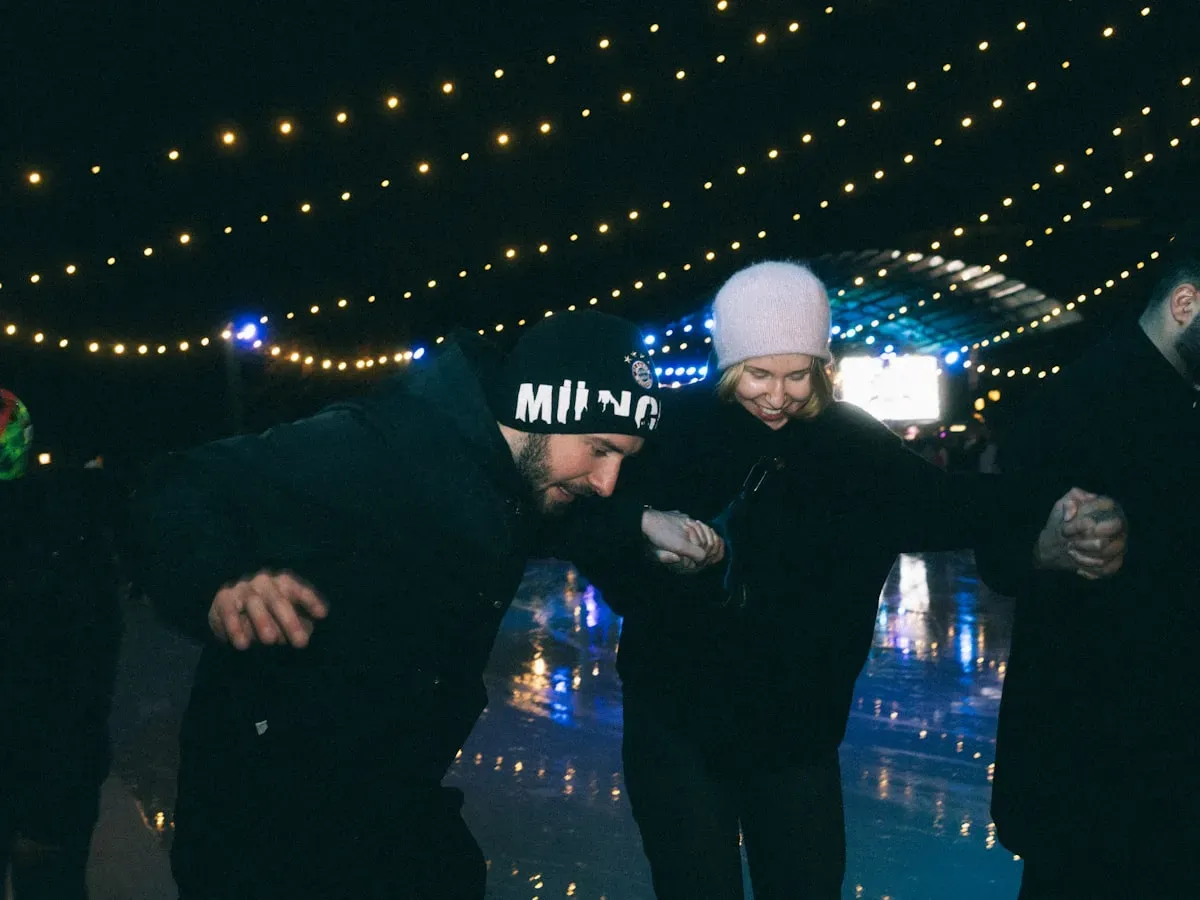 Evening skating at the Rink of Dreams with city lights