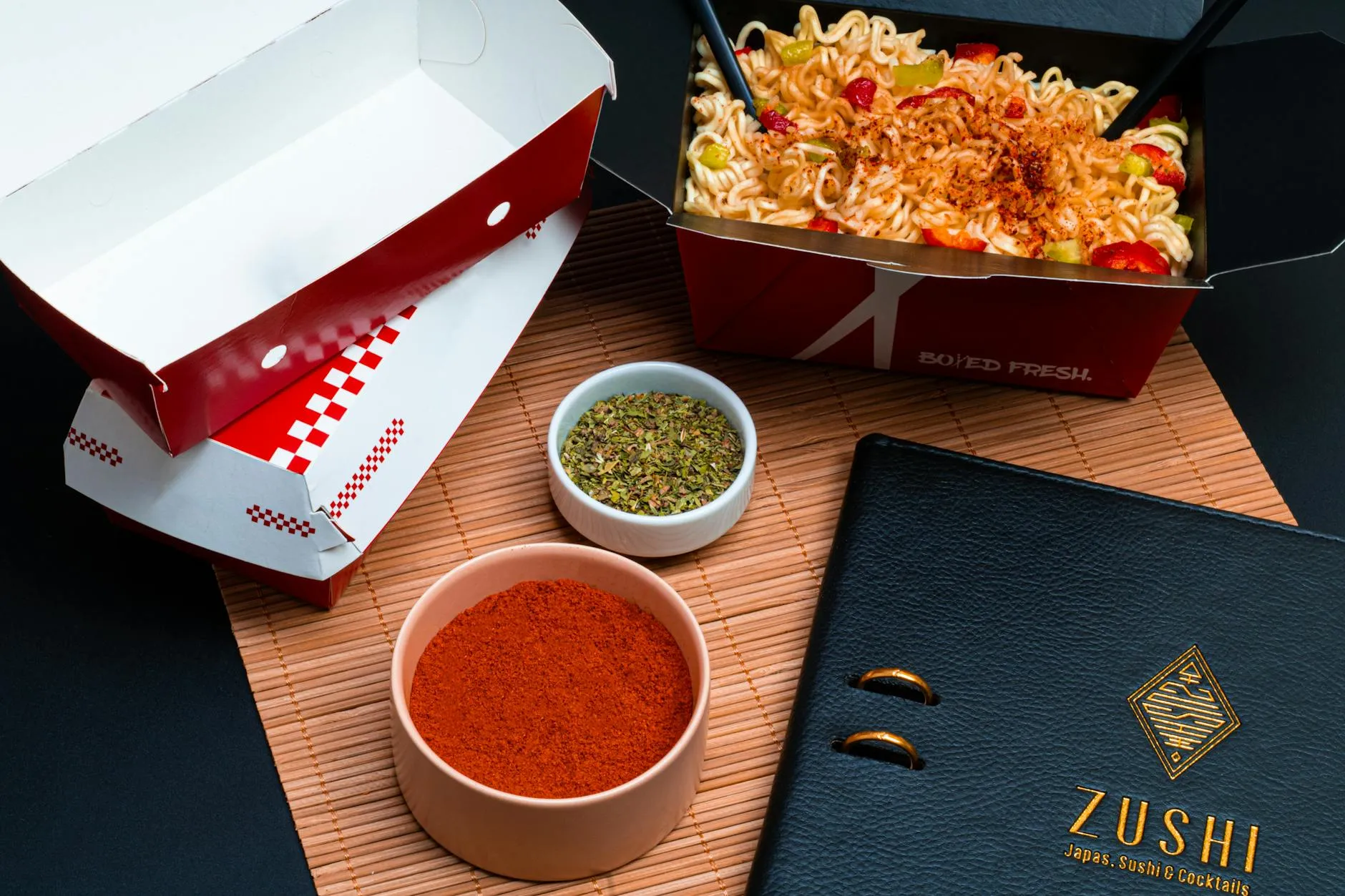 Takeout bag with Thai food containers