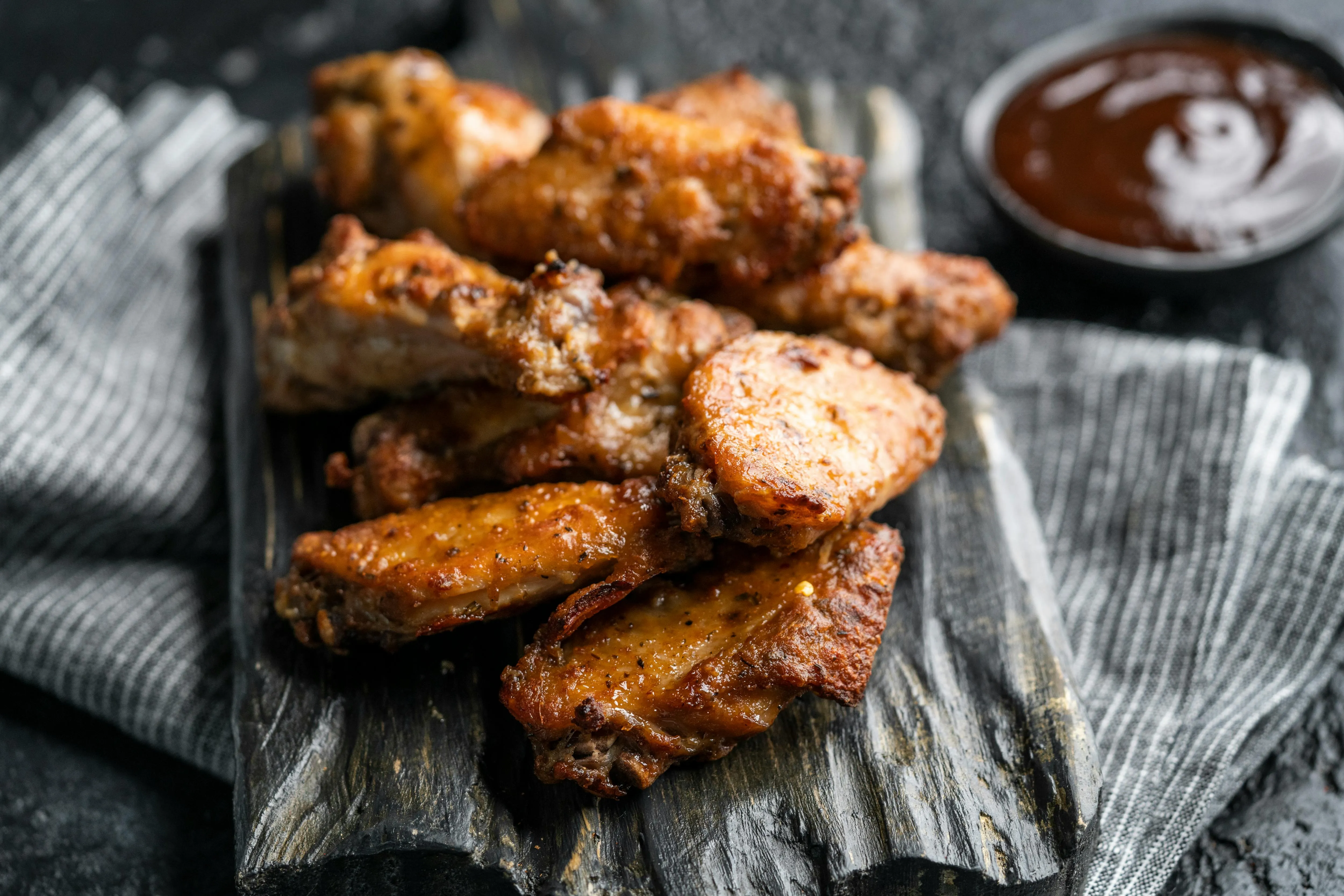 Saucy wings with messy napkins