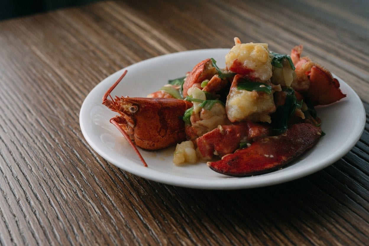 Ng's Cuisine lobster dish served family-style for a Cantonese seafood dinner in Ottawa