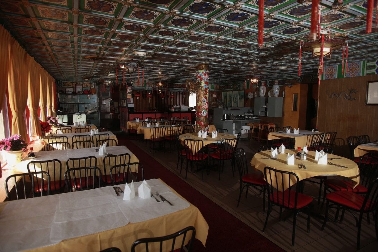 Golden Palace dining room with set tables and classic Chinese restaurant decor in Ottawa