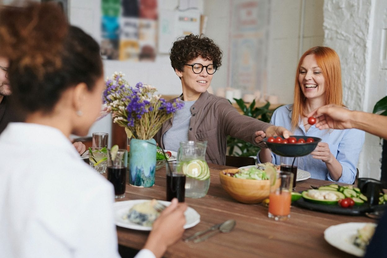 Family-style Mediterranean meal with large platters and easy group dining setup