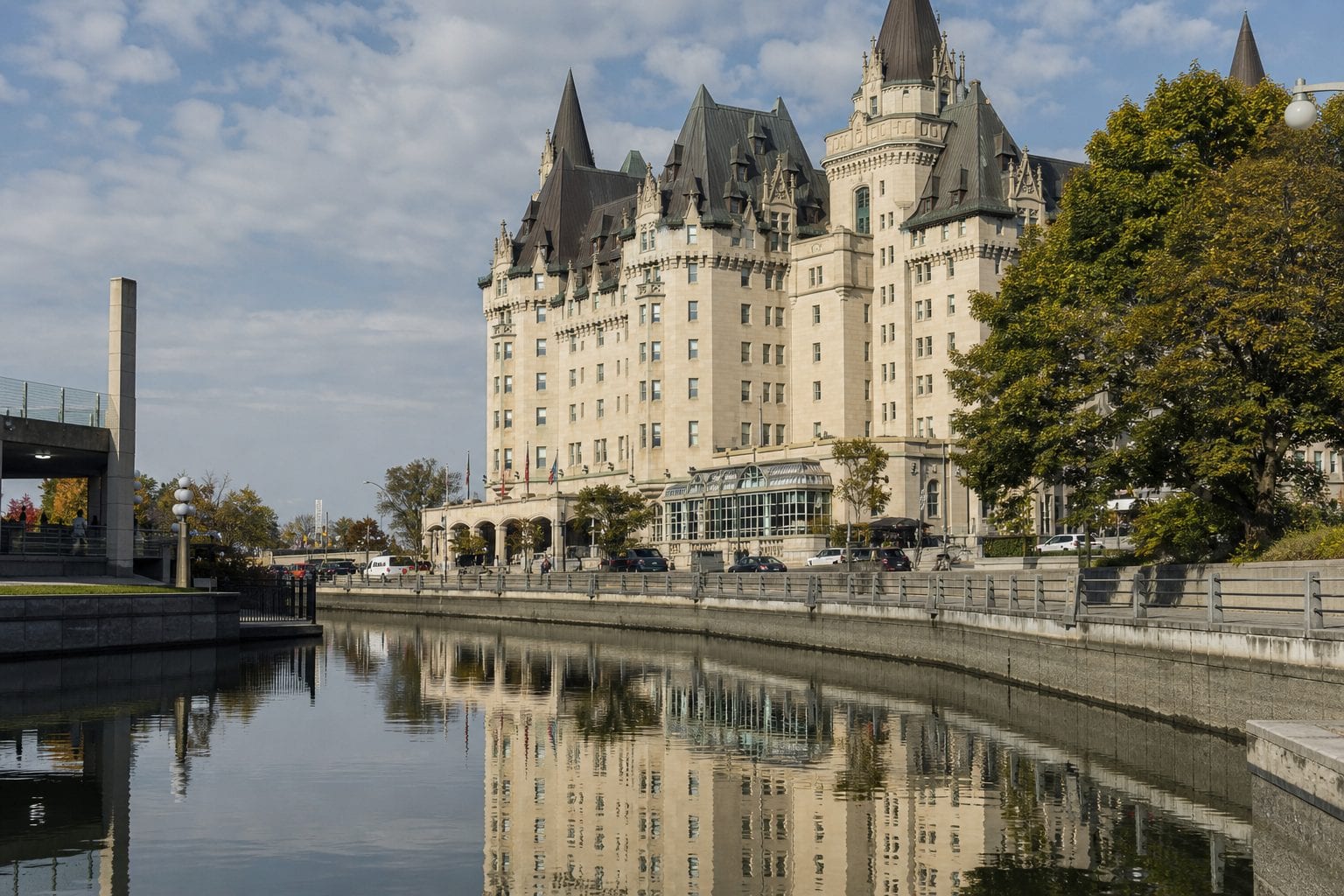 The Château Laurier historic hotel reflected in the Rideau Canal