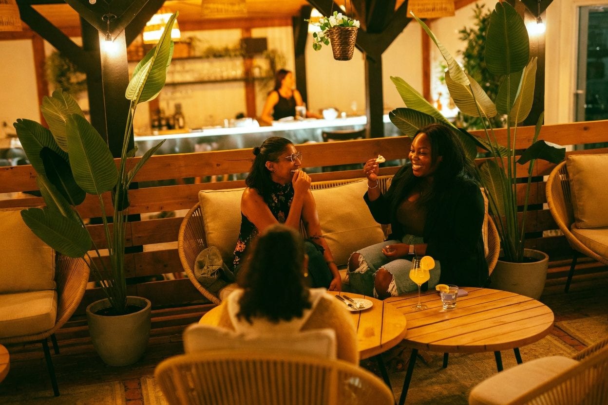 Alora Restaurant and Bar dining room with warm lighting and lounge seating for ByWard rooftop-style drinks