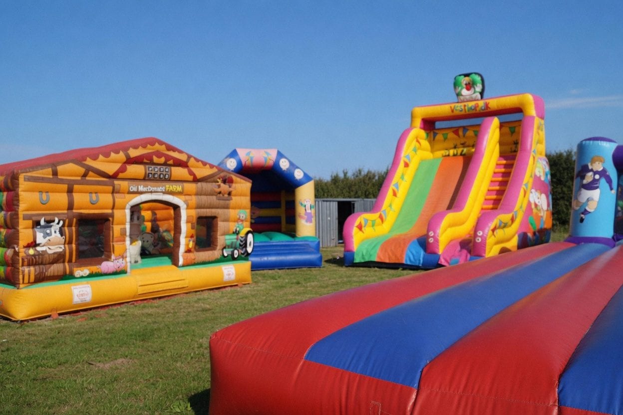 Kids laughing inside a bounce house