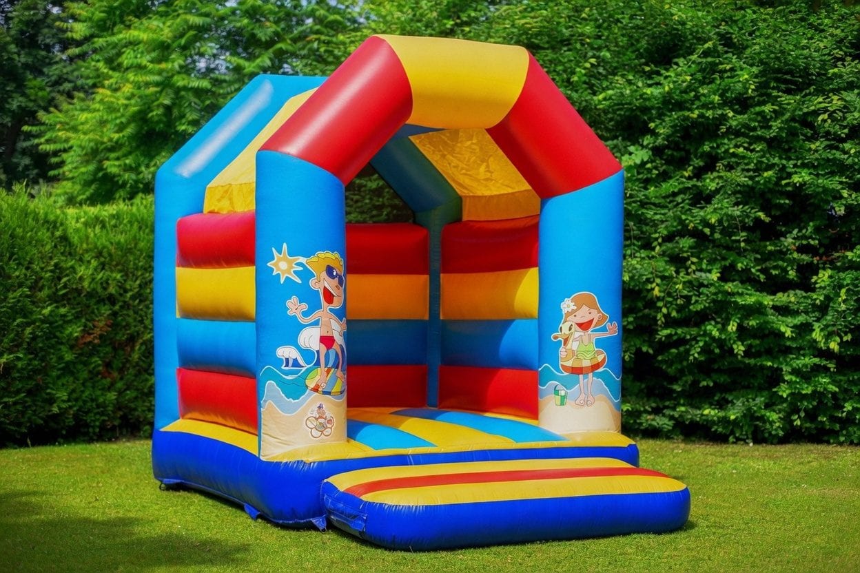 Power cable running to a backyard inflatable