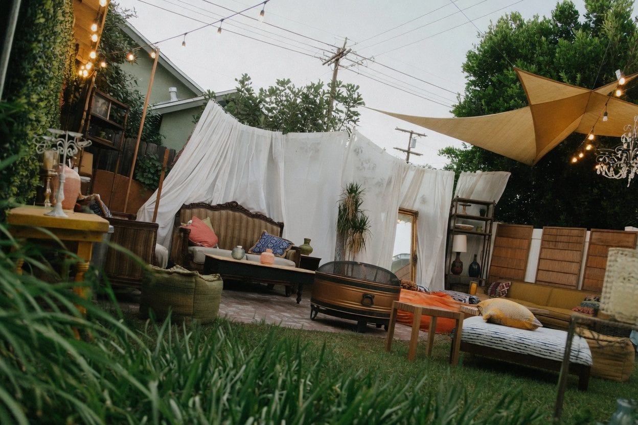 Parents setting up a backyard party area