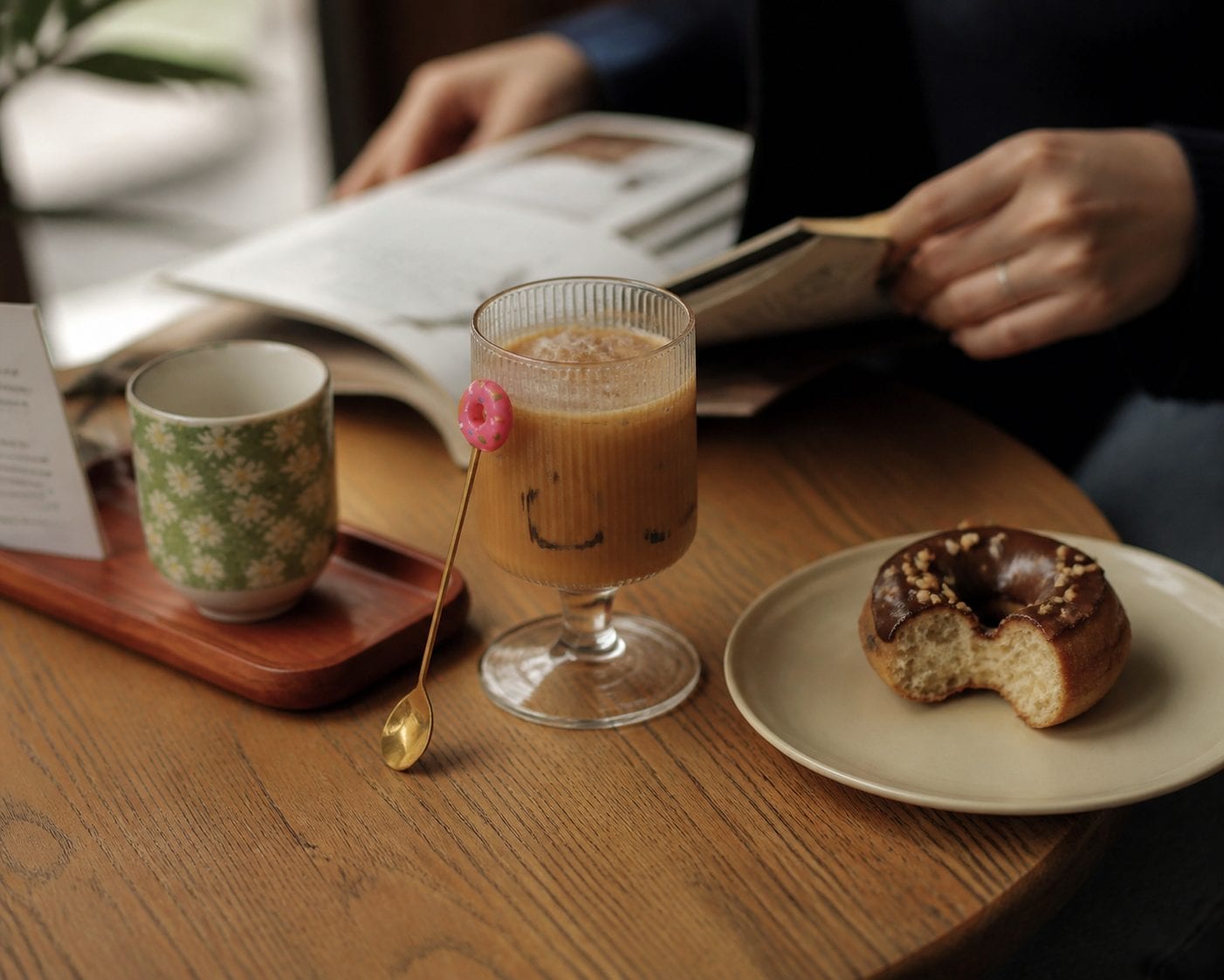 Coffee and donut on a small table