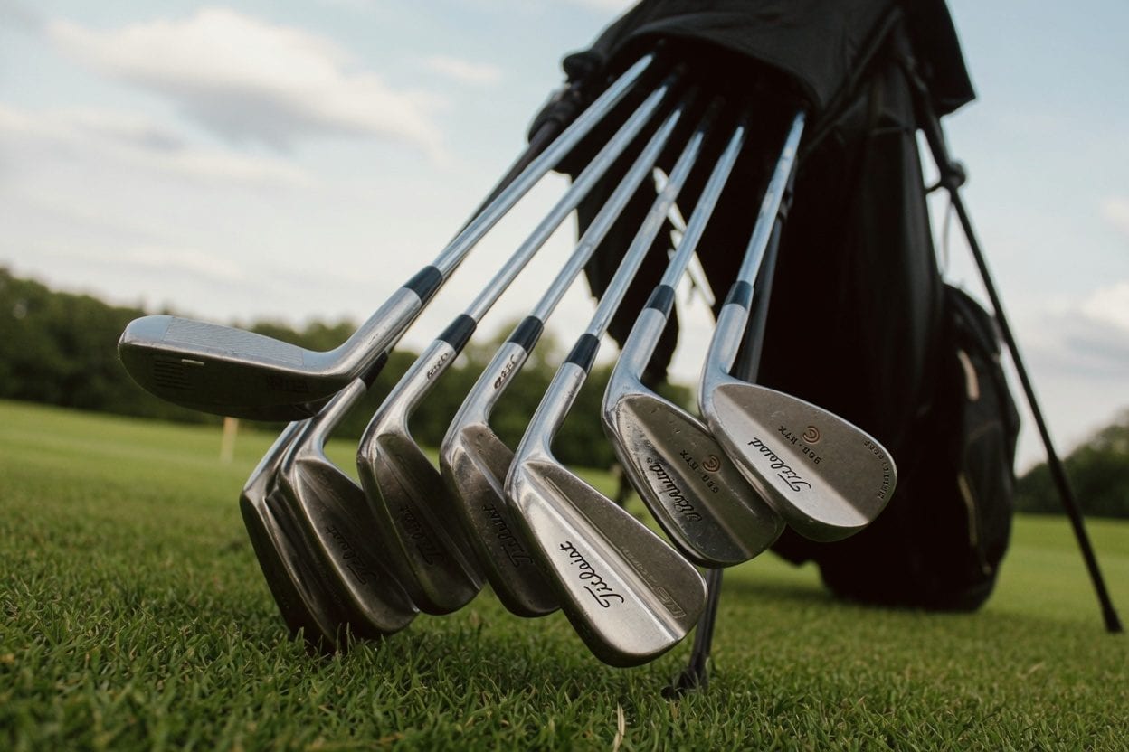 Golfer practicing swing at outdoor range
