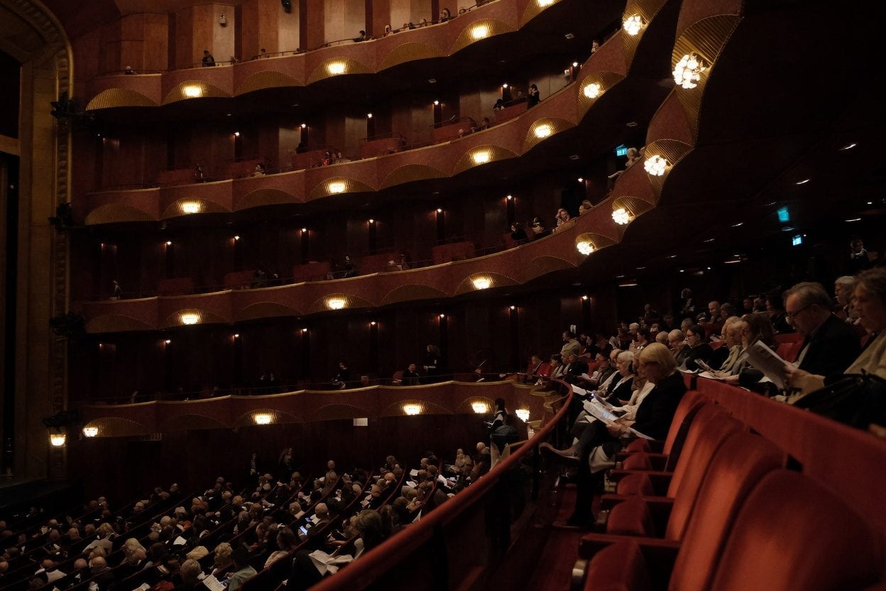 Audience watching film in concert at Ottawa venue