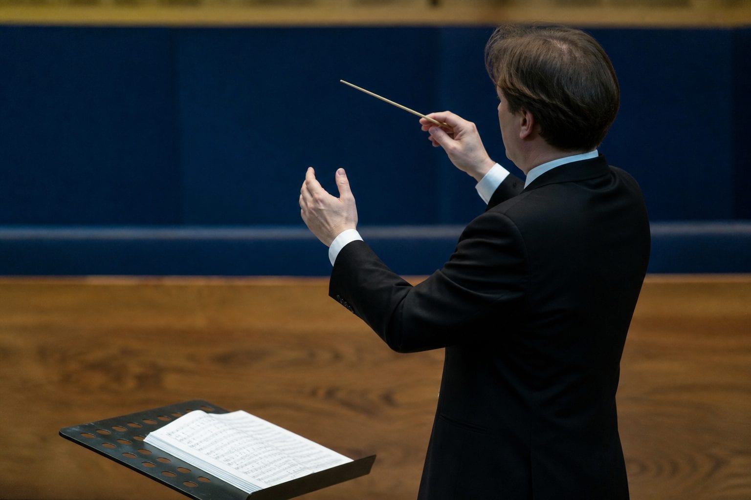 Film conductor with score and visual markers