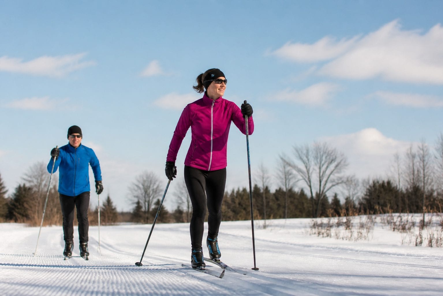 Cross-country skiers on groomed trail