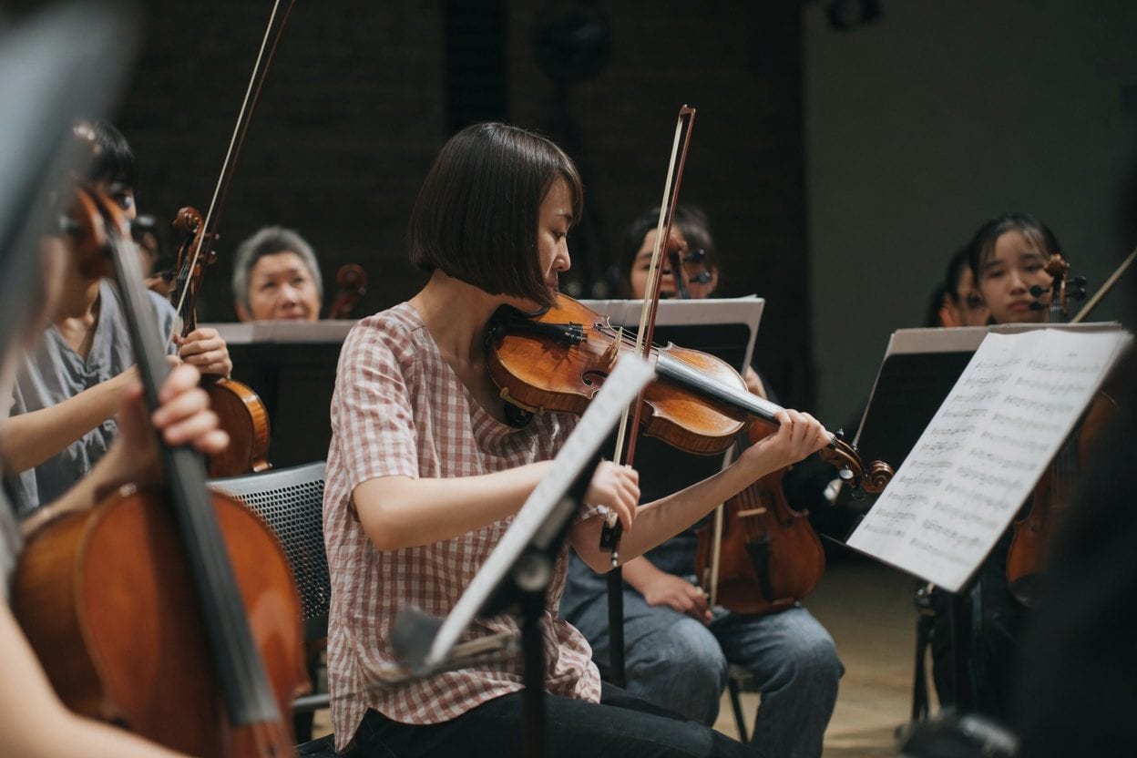 Family enjoying NAC concert experience