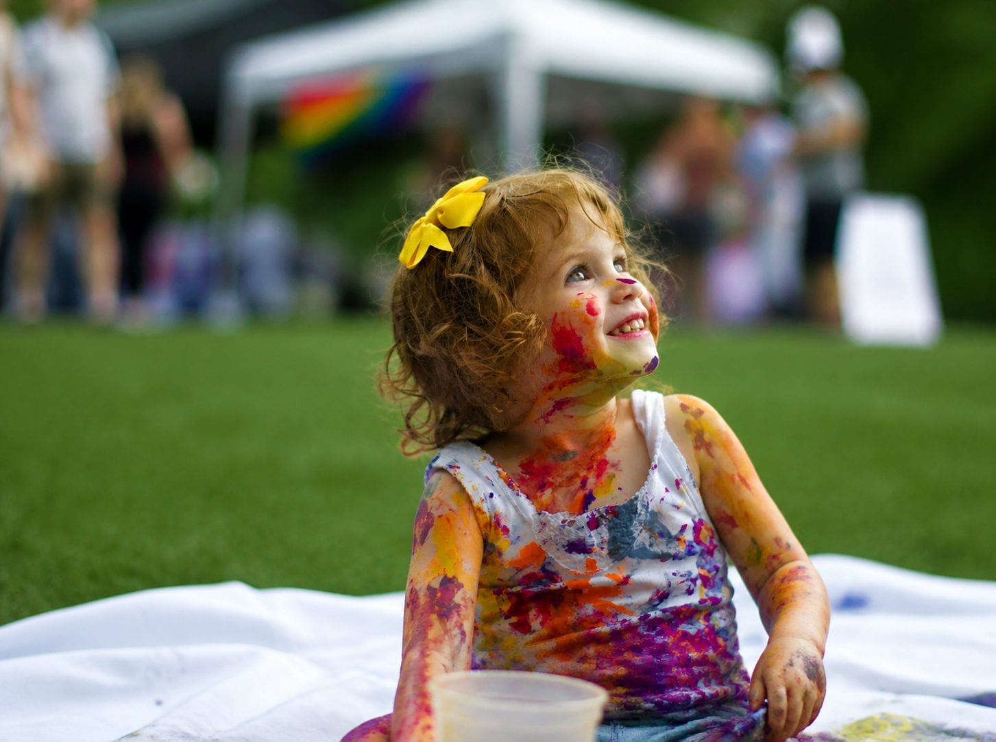 Families enjoying Pride activities with children at the festival