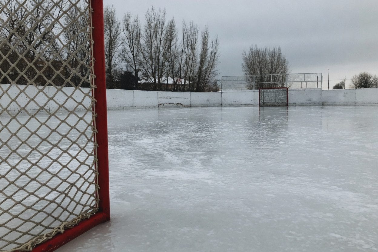 Hockey arena with crowd cheering