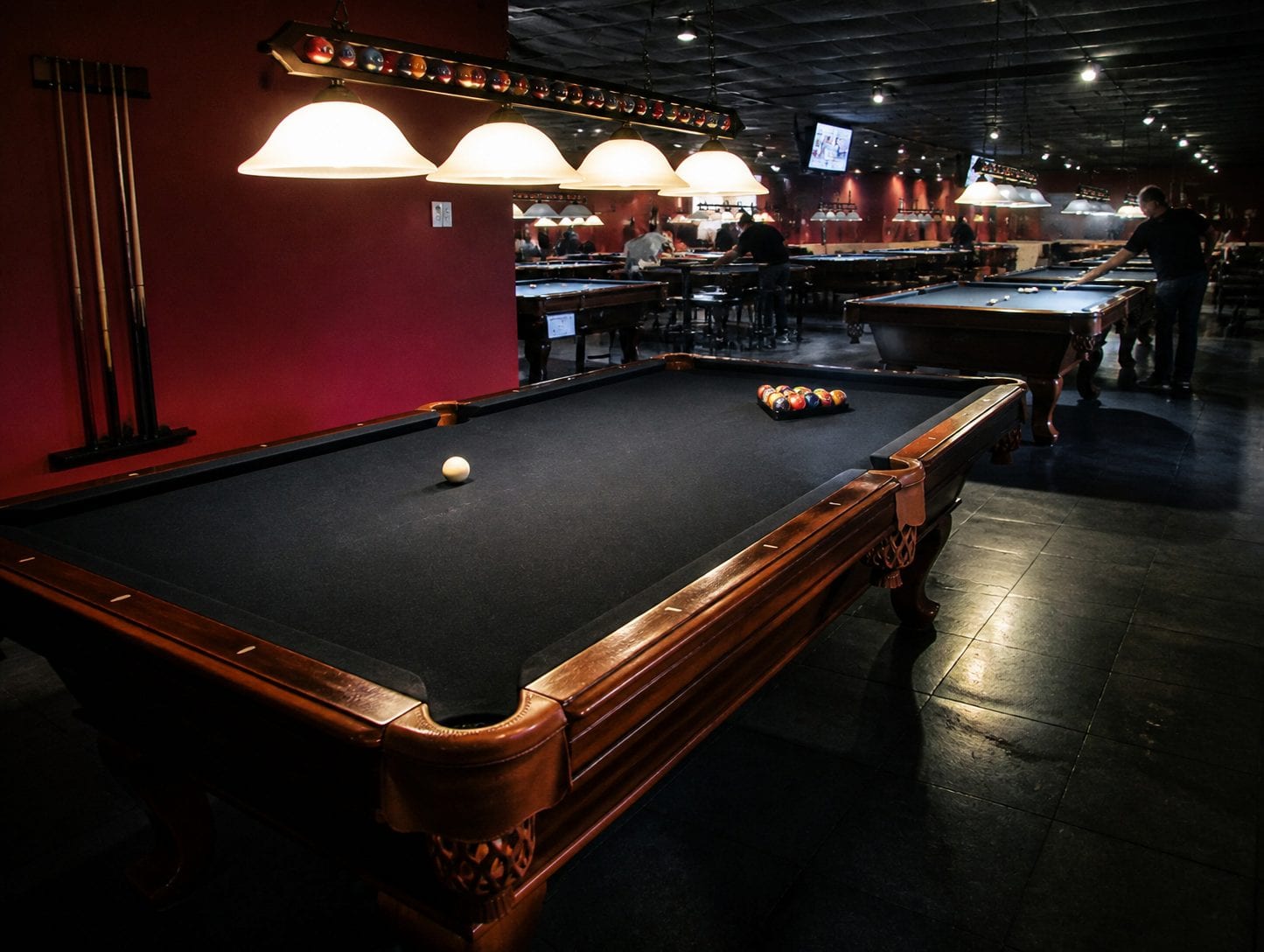 Large billiards venue with many pool tables