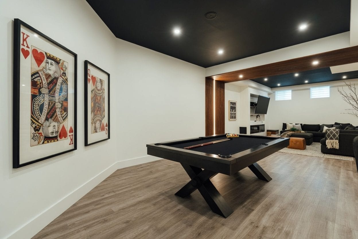 Pool cues on a wall inside a billiards pub
