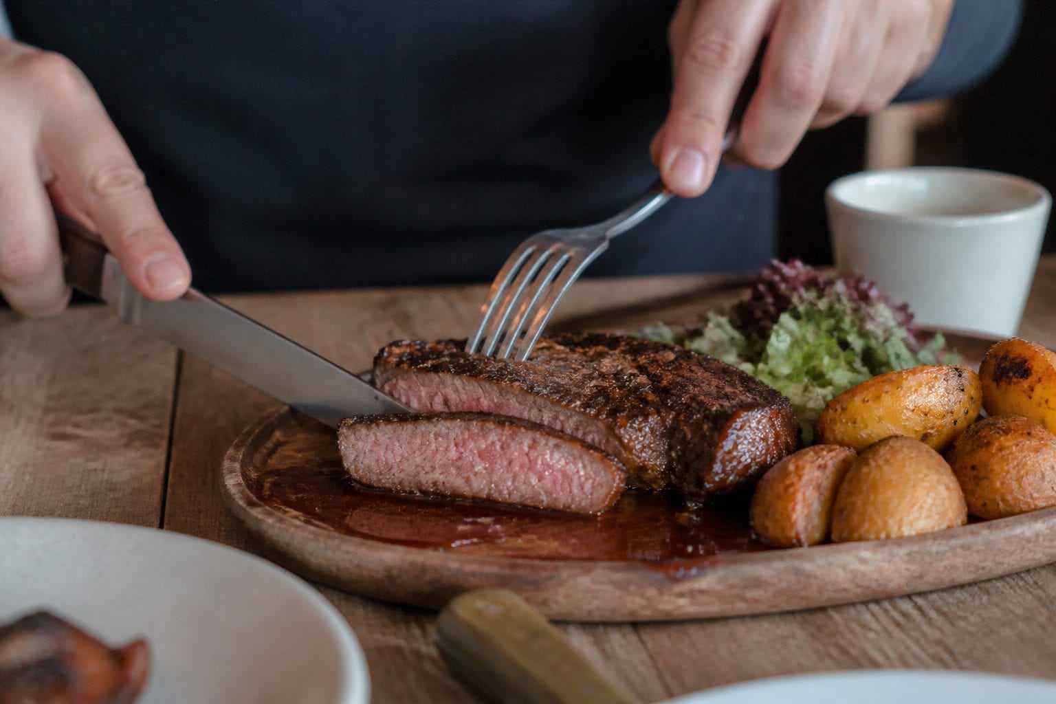 Perfectly cooked steak with sides