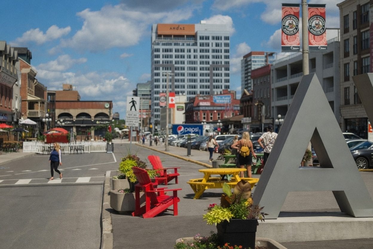People walking through a market street.