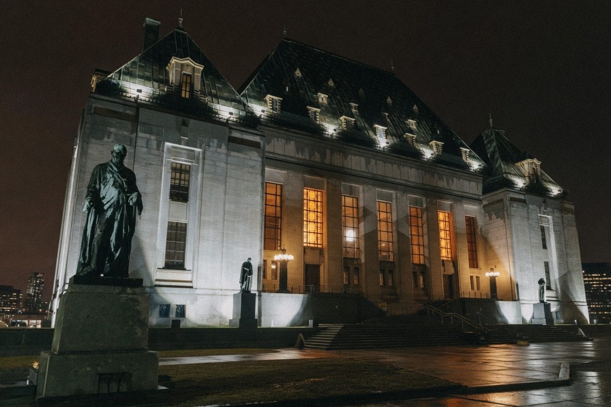 National Arts Centre lit up at night.
