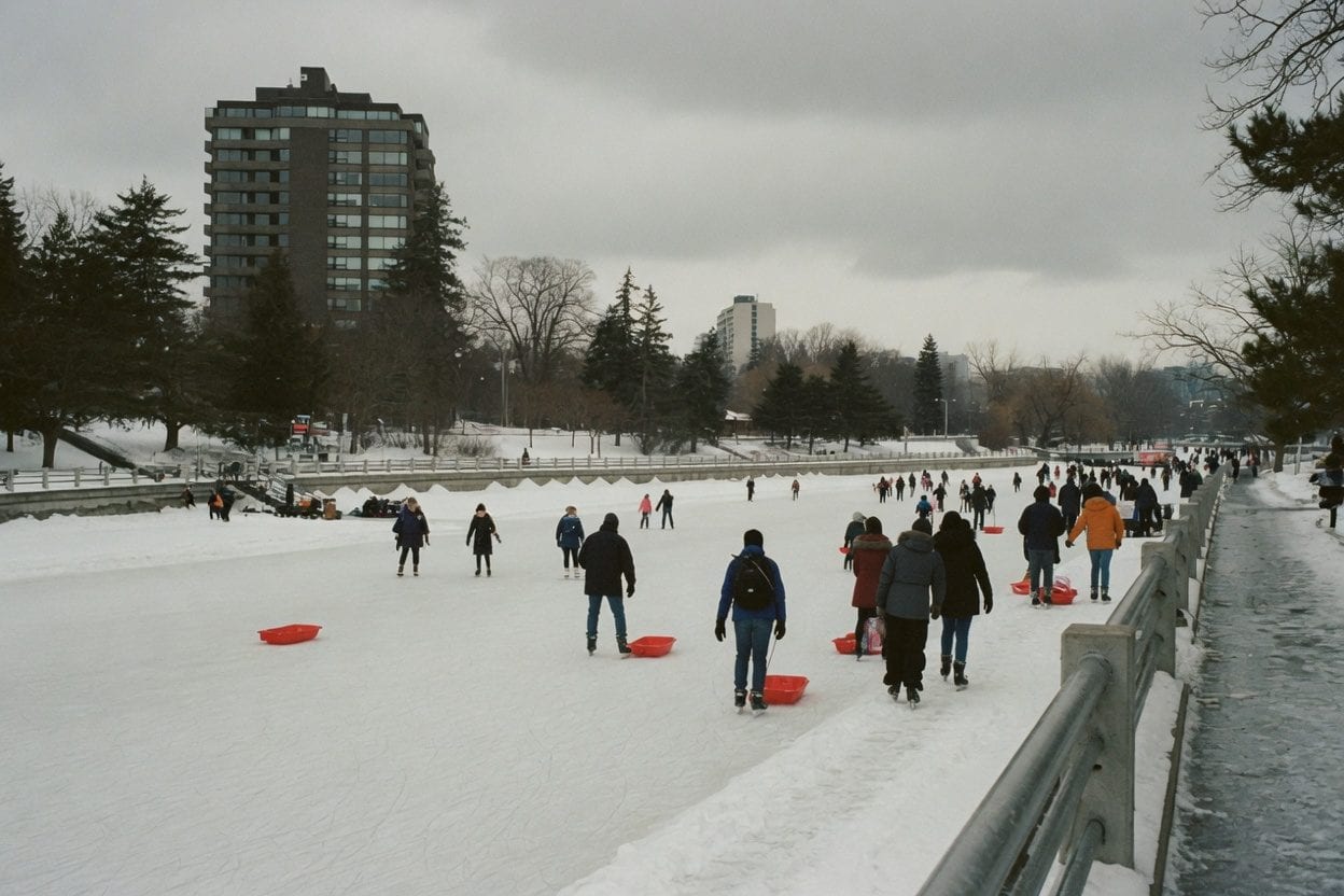 People walking through a snowy winter festival.