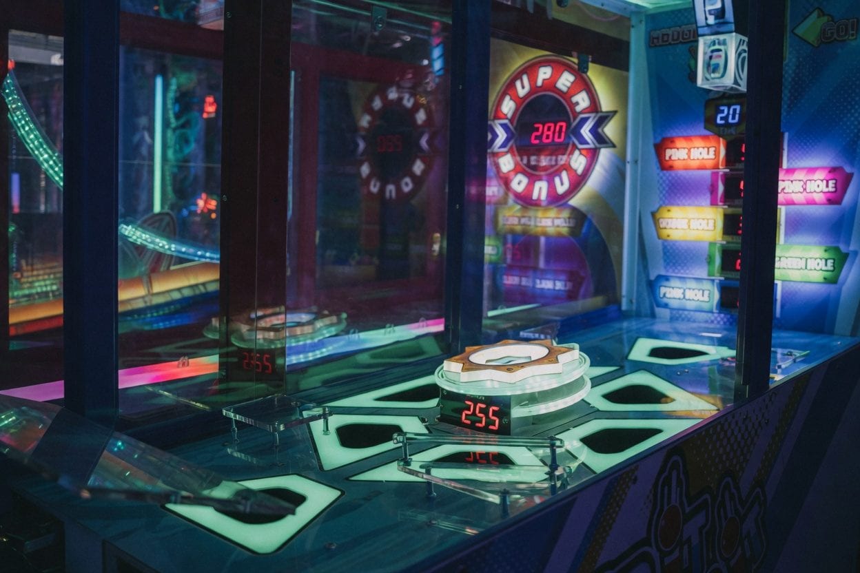 Arcade interior with VR ride pods