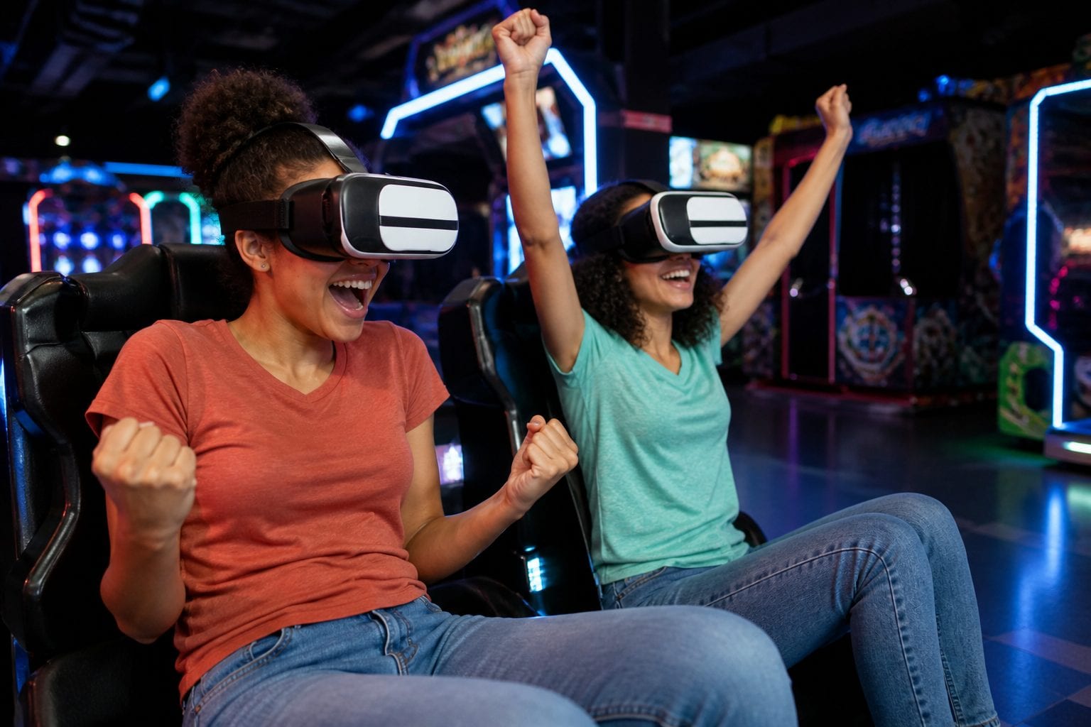 Friends in VR headsets cheering in a neon arcade