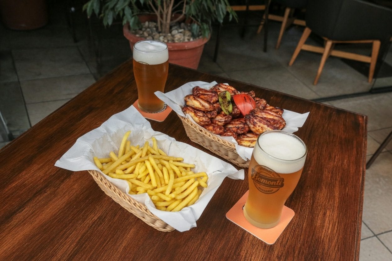 Late-night pub wings with beer