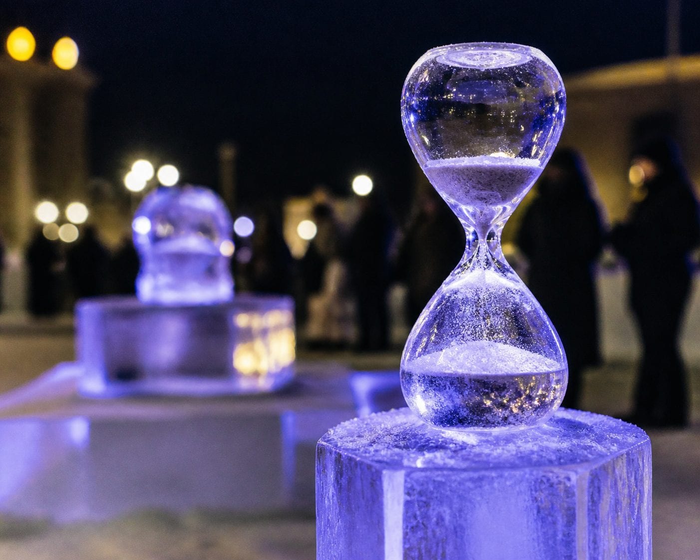 Night scene with illuminated ice sculptures